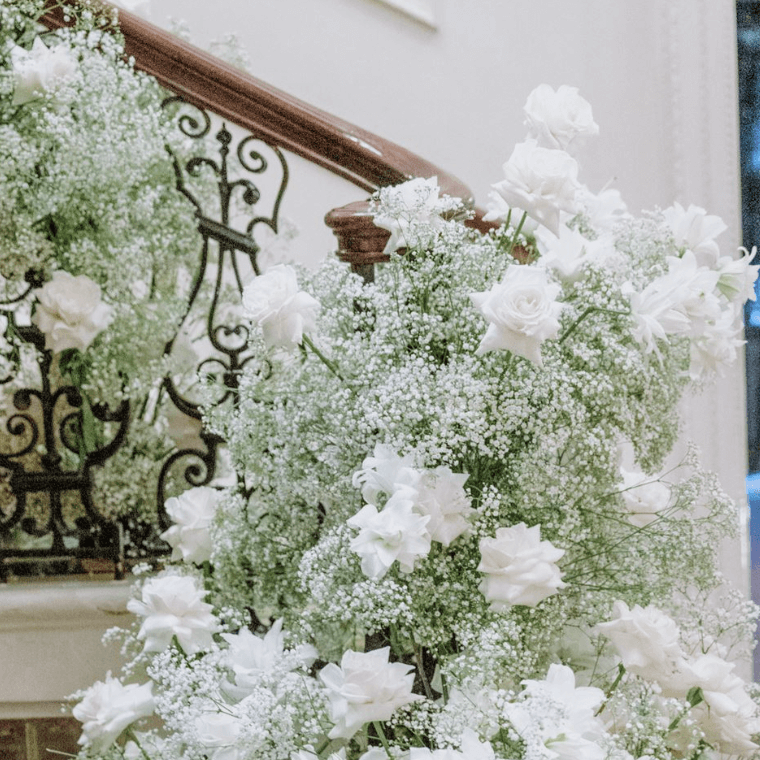 White flowers decorating a ballustrade