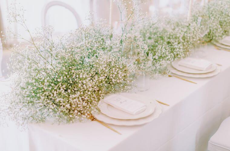 Gypsophila decorating a table at a wedding